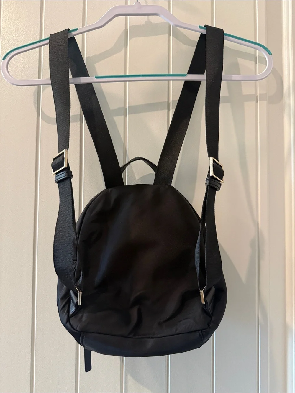 Kate Spade: black mini nylon backpack with gold hardware